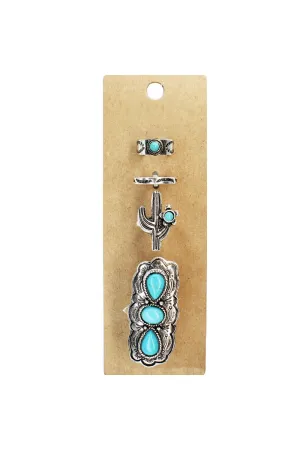 Four Piece Set Of Various Metal Rings With Turquoise Stones